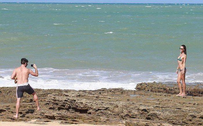 Đằng sau cô gái sống ảo chính là chàng trai chịu chụp ảnh