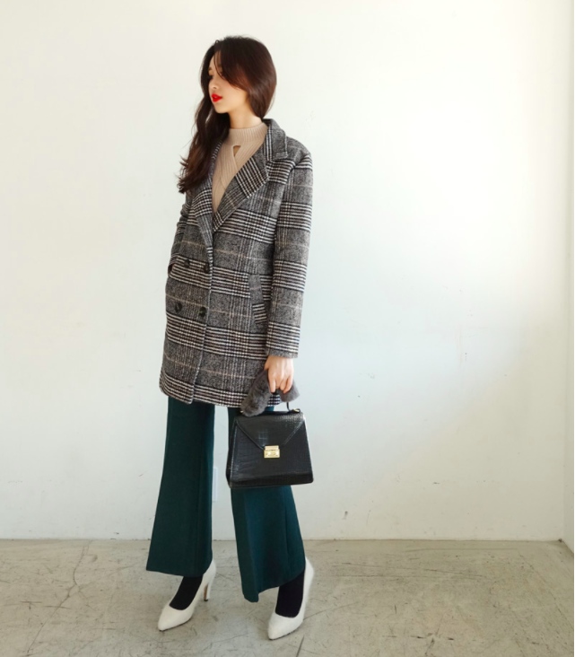 Chính xác thì đây là chiếc áo khoác dáng dài được các chị em nhiệt tình săn đón trong mùa lạnh này