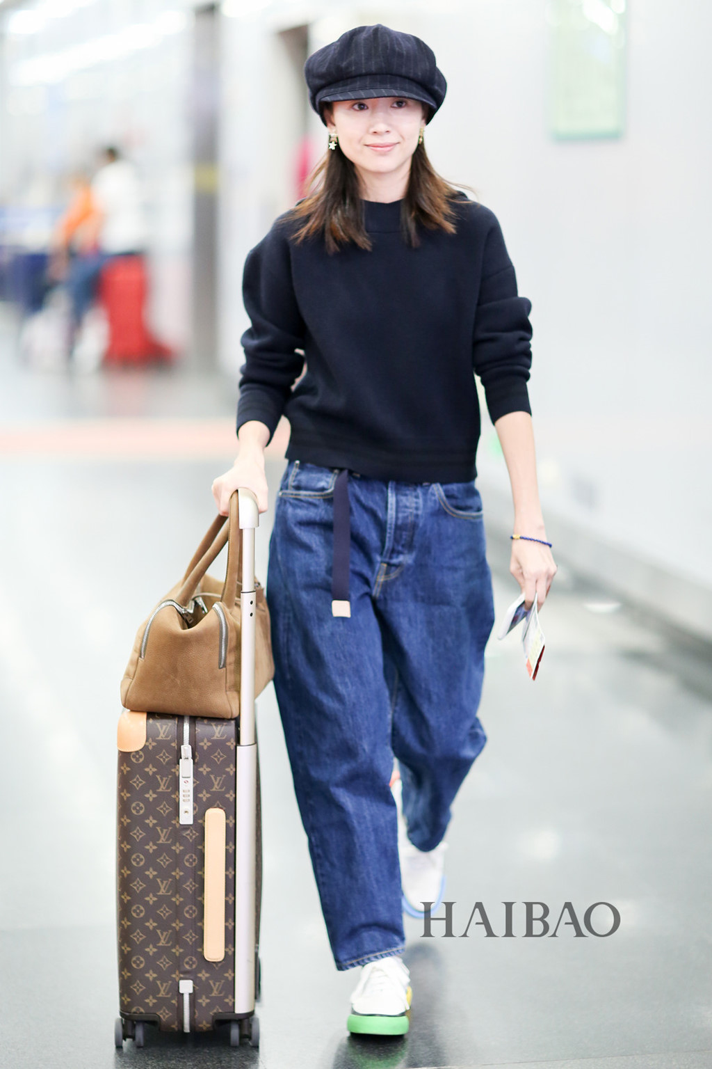 Mix quần jeans ống rộng ngày lạnh như thế nào?