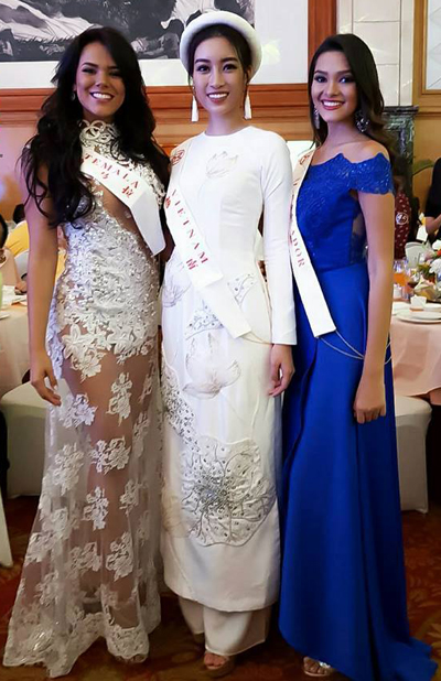 Mỹ Linh mặc áo dài, đội mấn dự tiệc tại Miss World