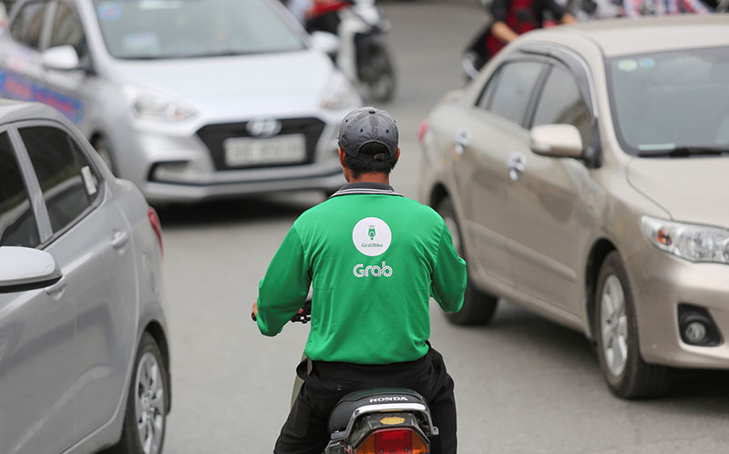 Grab tăng giảm chiết khấu: Vị trí của tài xế quá yếu thế để đàm phán