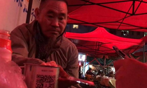 Ăn mày Trung Quốc dùng ví điện tử để xin tiền