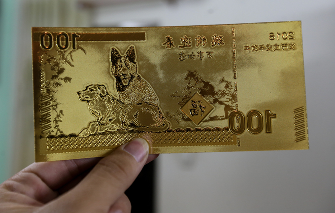 Săn tiền in hình linh vật Tết Mậu Tuất để lì xì ở Sài Gòn