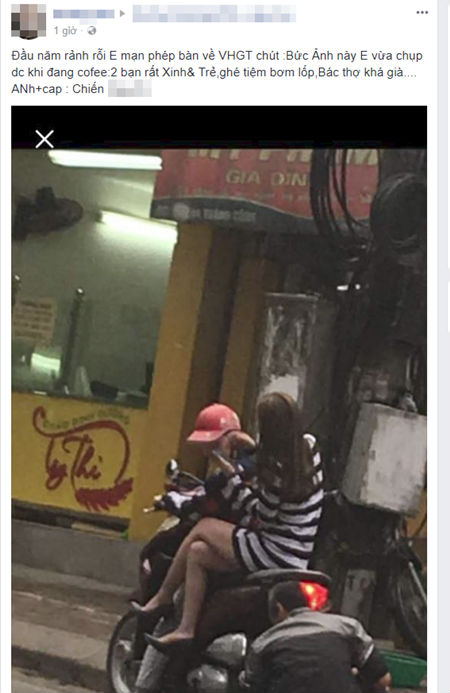 Cư dân mạng chê bai thiếu nữ mặc váy ngắn ngồi vắt vẻo trên xe khi bác thợ cặm cụi bơm lốp