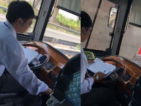 Tài xế vừa lái ôtô trên cao tốc vừa ghi chép sổ bị đình chỉ Tài xế vừa lái ôtô trên cao tốc vừa ghi chép sổ bị đình chỉ
