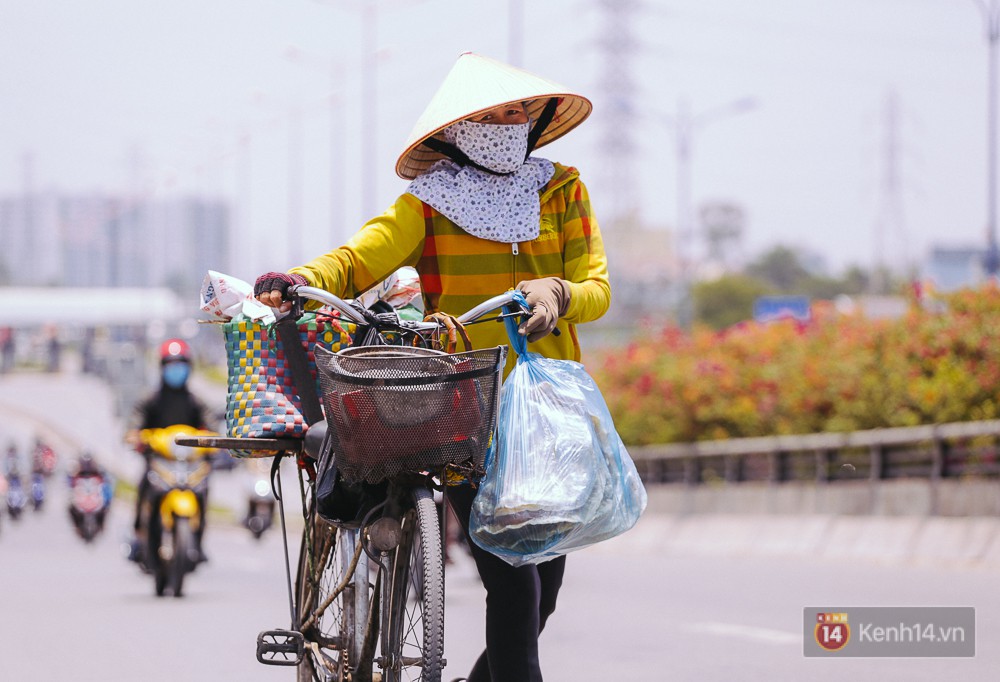 Chùm ảnh: Sài Gòn bước vào đợt nắng nóng đổ lửa, những ninja xuống phố