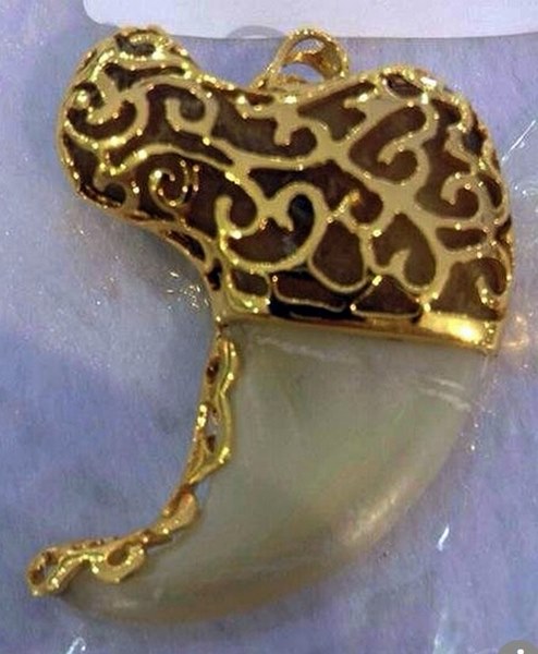 Vạn con báo gấm bị vặt răng để phục vụ thú chơi nhà giàu TQ