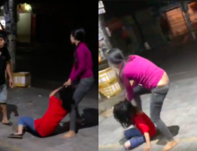 Thấy vợ lao vào túm tóc, đập đầu nhân tình xuống đường, người chồng can ngăn không được liền phóng ô tô bỏ đi