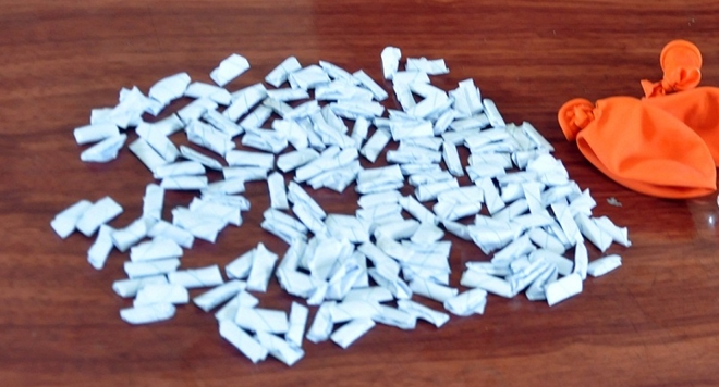 Giấu 175 gói heroin vào 2 quả bóng bay định vượt biên sang Trung Quốc