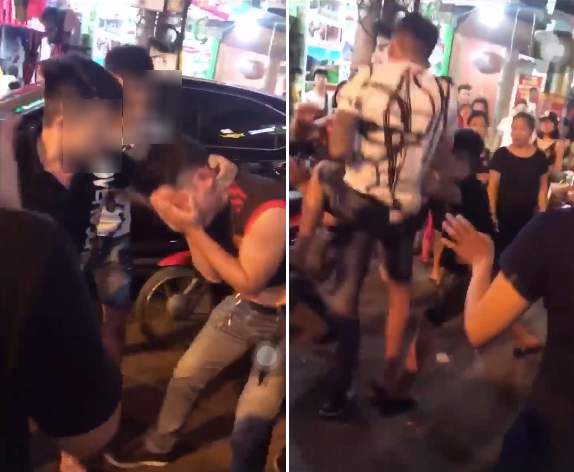 Nam thanh niên bị túm tóc, đánh ghen túi bụi giữa phố vì dám thả thính phụ nữ đã có chồng