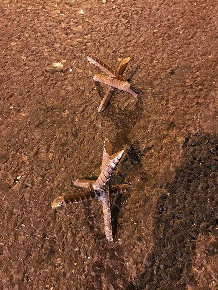 Hàng loạt ôtô dính ‘bẫy chông’ trên quốc lộ 18