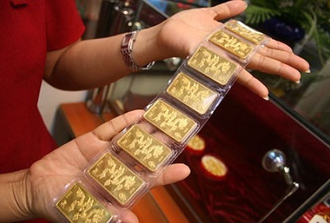 Giá vàng và USD cùng giảm mạnh