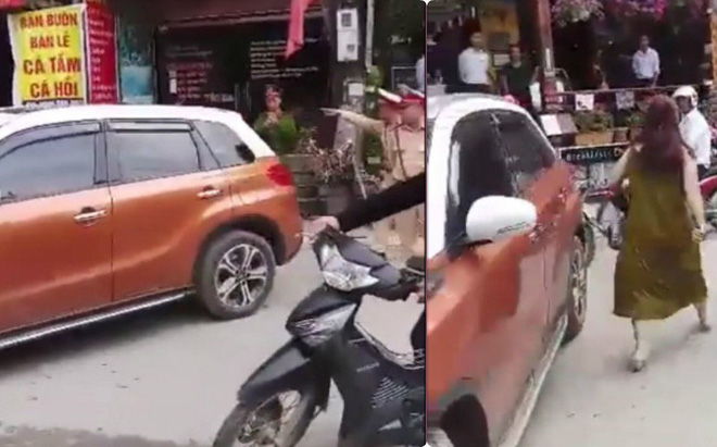 Bị nhắc đỗ xe gây cản trở, nữ tài xế lái xe chặn ngang đường thách thức CSGT Bị nhắc đỗ xe gây cản trở, nữ tài xế lái xe chặn ngang đường thách thức CSGT