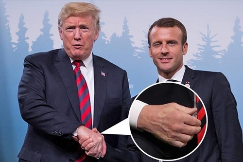 Tay Trump hằn vết sau cú bắt tay với Macron