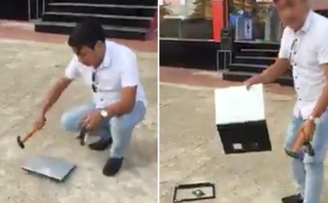 Bức xúc vì chiếc laptop mới mua lỗi lên lỗi xuống, người đàn ông dùng búa đập tan tành ngay trước cửa hàng