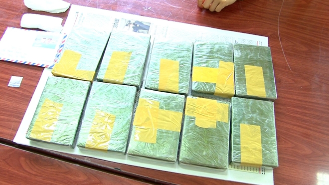 Thiếu nữ hai lần xách 14 bánh heroin theo xe khách từ Điện Biên về Hà Nội