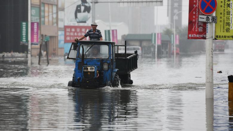 Kinh hoàng thảm họa mưa bão, lũ lụt, nắng nóng tàn phá khắp châu Á Kinh hoàng thảm họa mưa bão, lũ lụt, nắng nóng tàn phá khắp châu Á