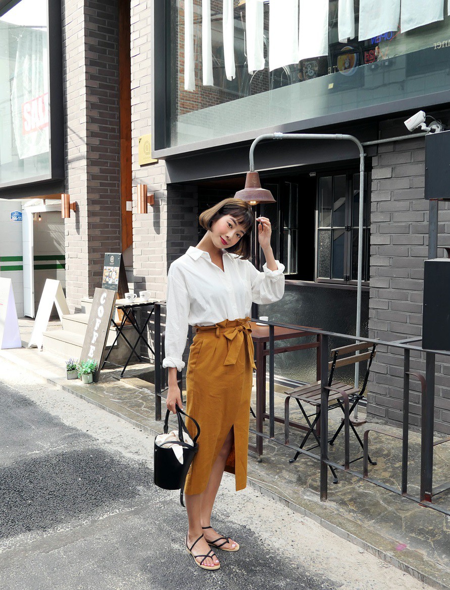 Vừa giấu khéo bụng lớn lại kéo chân tuyệt đỉnh, chẳng trách quần vải thắt nơ lại gây sốt suốt mùa hè/thu năm nay