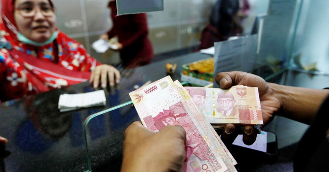 Doanh nghiệp và người tiêu dùng châu Á khốn khổ khi đồng nội tệ mất giá Doanh nghiệp và người tiêu dùng châu Á khốn khổ khi đồng nội tệ mất giá