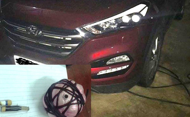 Nam thanh niên báo phát hiện gầm ô tô bị cài vật lạ đang cháy, nghi có gắn thuốc nổ Nam thanh niên báo phát hiện gầm ô tô bị cài vật lạ đang cháy, nghi có gắn thuốc nổ