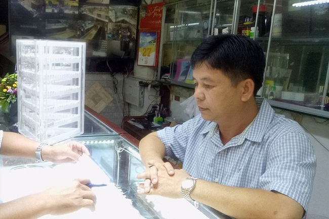 Vụ đổi 100 USD bị phạt 90 triệu: Vì sao bắt quả tang mà hơn nửa năm mới phạt?