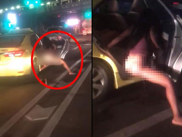 Đang dừng đèn đỏ, cô gái thò chân xuống ôtô làm một hành động khiến người đi đường choáng váng