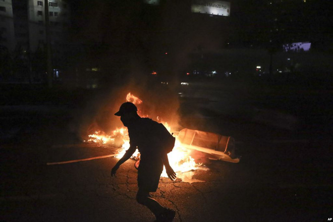 7 ngày qua ảnh: Các hoạt náo viên nóng bỏng khuấy đảo giữa 2 hiệp đấu bóng bầu dục