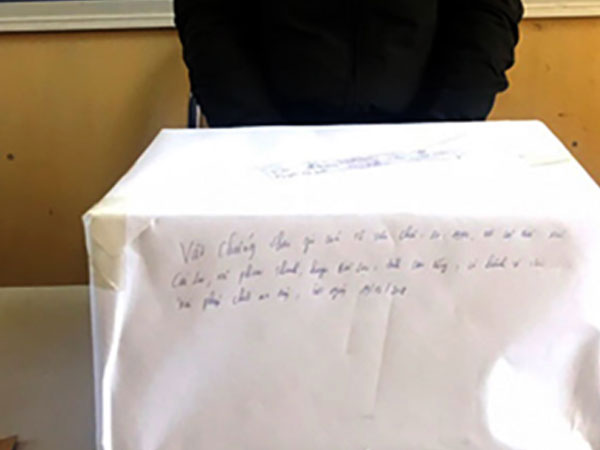 Bao tải heroin trong xe ôtô ở Lóng Luông