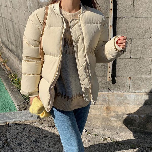 Giữ ấm vô địch lại giúp các nàng trông sành điệu và trẻ ra vài tuổi, đó chính là áo phao dáng ngắn