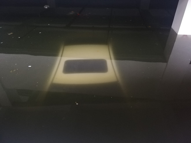 Tranh cãi chuyện đền bù ôtô bị ngâm nước ở chung cư Hoàng Anh Gia Lai