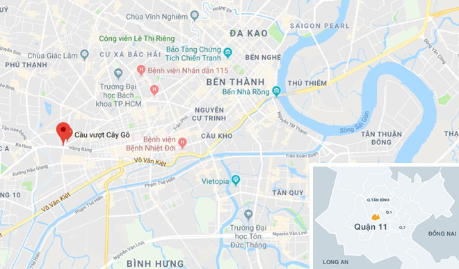 Xe tải lật trên cầu vượt Cây Gõ, 2 người bị thương