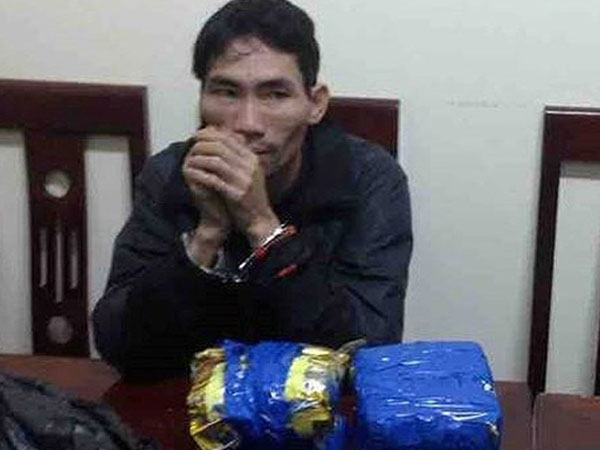 Người đàn ông sa lưới khi mang 8 bánh heroin từ Lào về Việt Nam tiêu thụ
