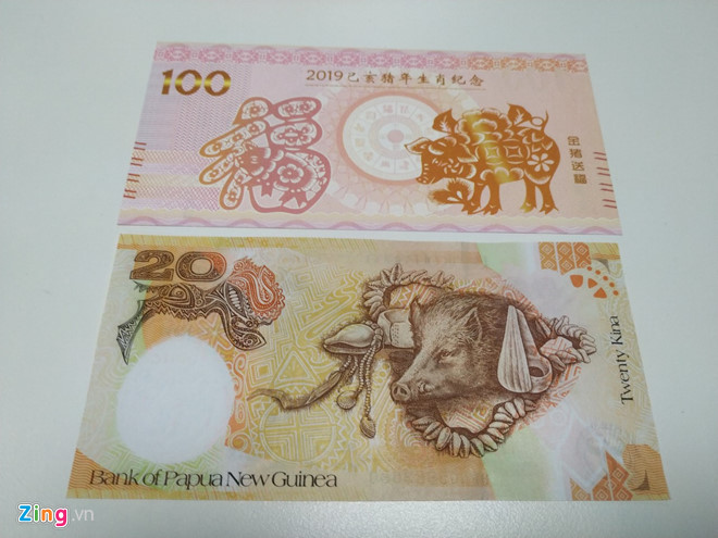 Rộ tiền lì xì in hình con heo, mua bán có đúng luật?