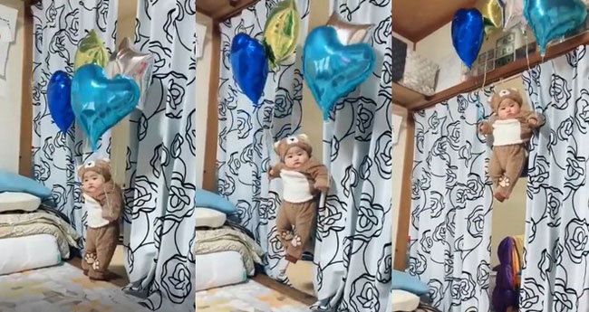 Cười bò với biểu cảm của em bé bị thả bay lơ lửng, dân mạng rủ nhau không nhìn thấy sự sắp đặt phía sau