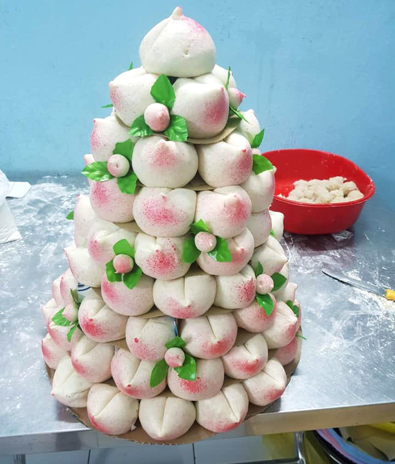 Phát sốt với cỗ Rằm tháng Giêng 100 cái bánh bao đào tiên hồng rực