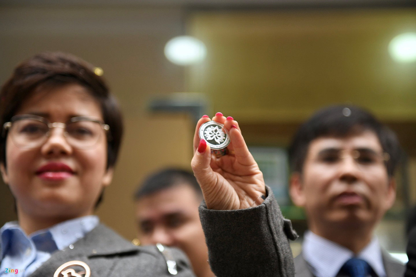 Chen chân mua đồng xu kỷ niệm thượng đỉnh Mỹ - Triều