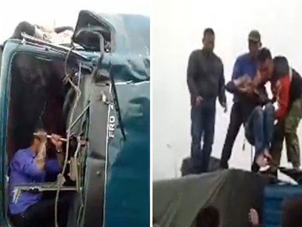 Xe tải bị đâm nát đầu, tài xế gào khóc đau đớn trong buồng lái