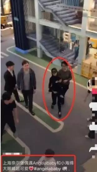 Bị chỉ trích vì phì phèo thuốc lá, Angelababy lấy lại hình ảnh bằng cách tay đau vẫn bế con đi chơi