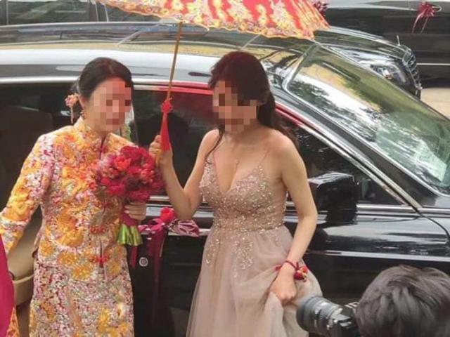 Phù dâu trễ nải khoe ngực khủng khiến cô dâu bị dìm hàng không thương tiếc