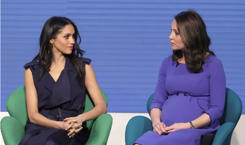 Hé lộ lý do bất ngờ đằng sau hành động Meghan thích nắm tay chồng nơi đông người và nhìn chằm chằm chị dâu Kate