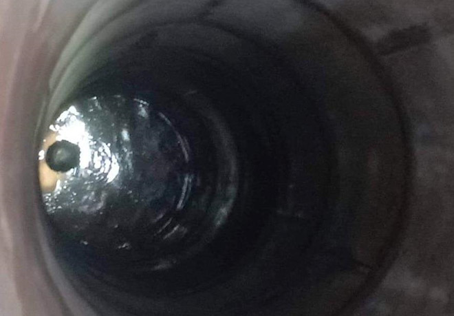 Thanh niên nghi ngáo đá tự cắt cổ dưới giếng sâu