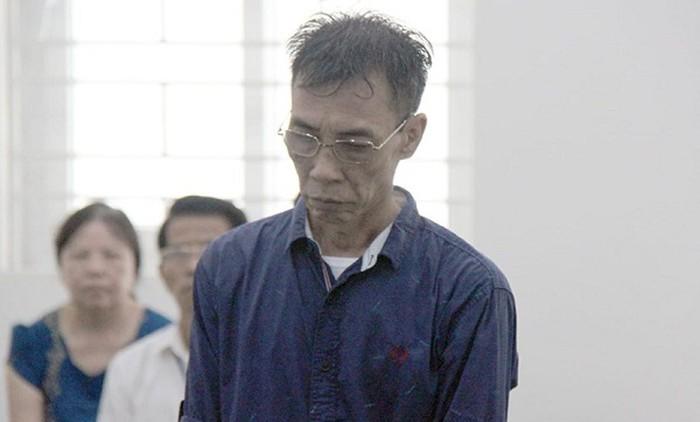 Nguyễn Trọng Nghĩa bị đưa ra tòa xét xử.