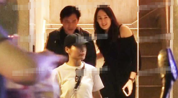 Hình ảnh Lương Triều Vỹ bên cô gái lạ mặt.