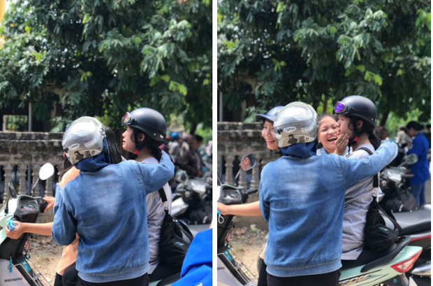 Nữ sinh khóc nức nở khi làm bài thi Toán không tốt, bỗng nhiên được một cô phụ huynh và bạn nữ chạy đến bóp má, động viên tinh thần. (Ảnh: Phương Anh)