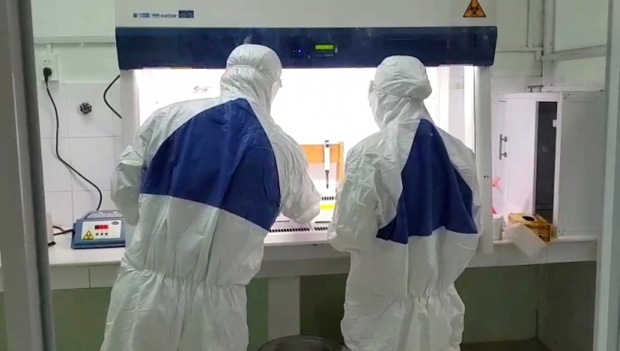 Xét nghiệm sàng lọc SARS-CoV-2. Ảnh: Báo Nhân Dân