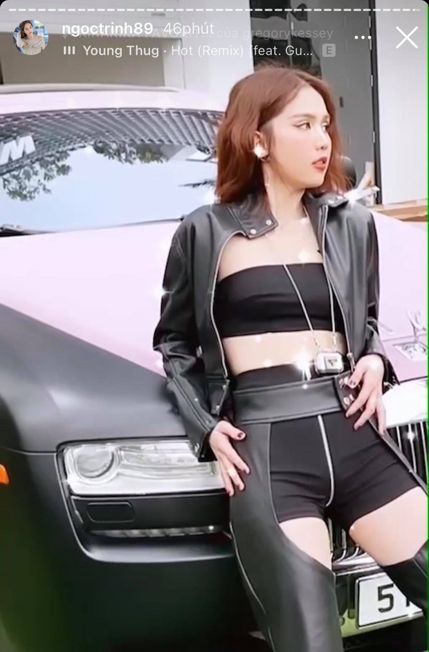 Giữa lúc thông tin về màn khẩu chiến của Cao Thái Sơn và Nathan Lee lan truyền trên MXH, Ngọc Trinh vẫn bình thản đăng clip tạo dáng bên siêu xe