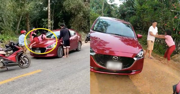 Hình ảnh người vợ nằm trên nắp capo ô tô khi bắt gặp chồng chở người phụ nữ khác (Ảnh cắt từ clip)