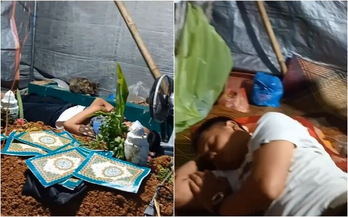 Dù đang nằm cạnh ngôi mộ mới nhưng nam thanh niên vẫn ngủ rất ngon lành. 