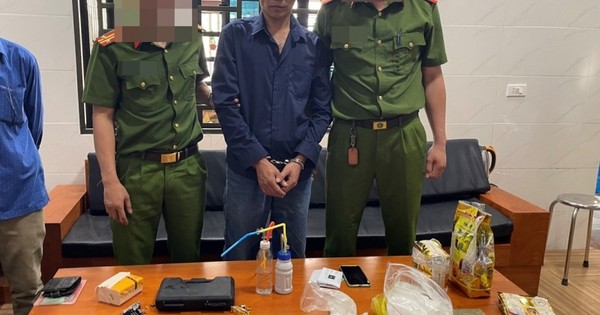 Trần Quốc Lô tại cơ quan công an. Ảnh: Công an cung cấp