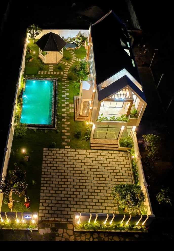 Biệt thự về đêm đẹp lung linh với ánh đèn. 